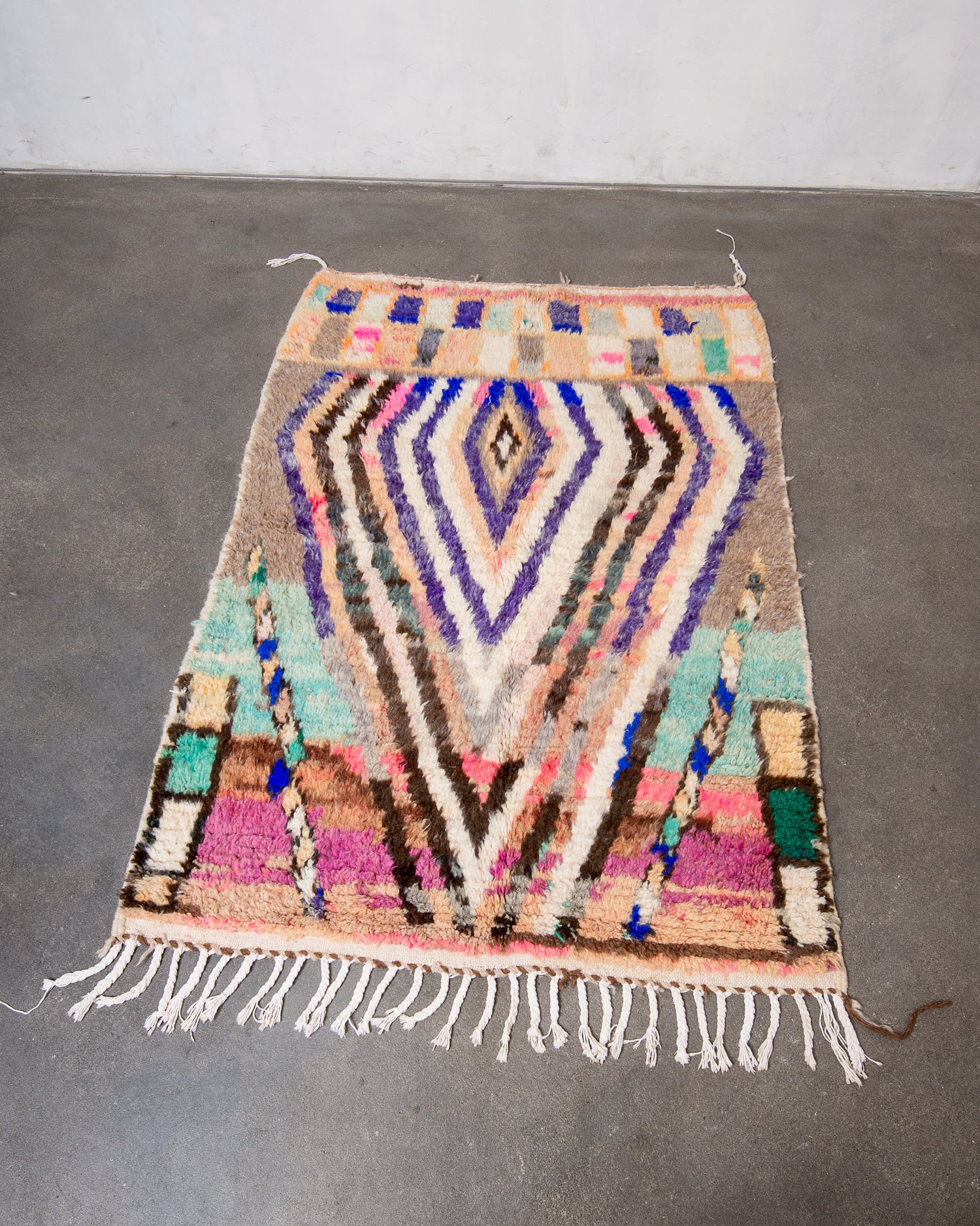 Modern, designer, handcrafted Berber rug from Morocco. Vintage carpet with beautiful colours and patterns and fluffy texture.